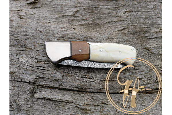 middle_lock_folding_knife_warthog_tusk_handle_damasteel_vinland_blade