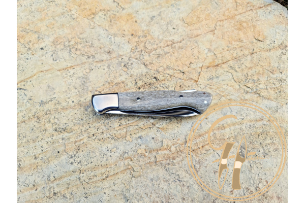 serpent_backlock_folding_knife_titanium_liner_bolser_giraffe_leg_bone_handle_sb1_niolox_blade_2